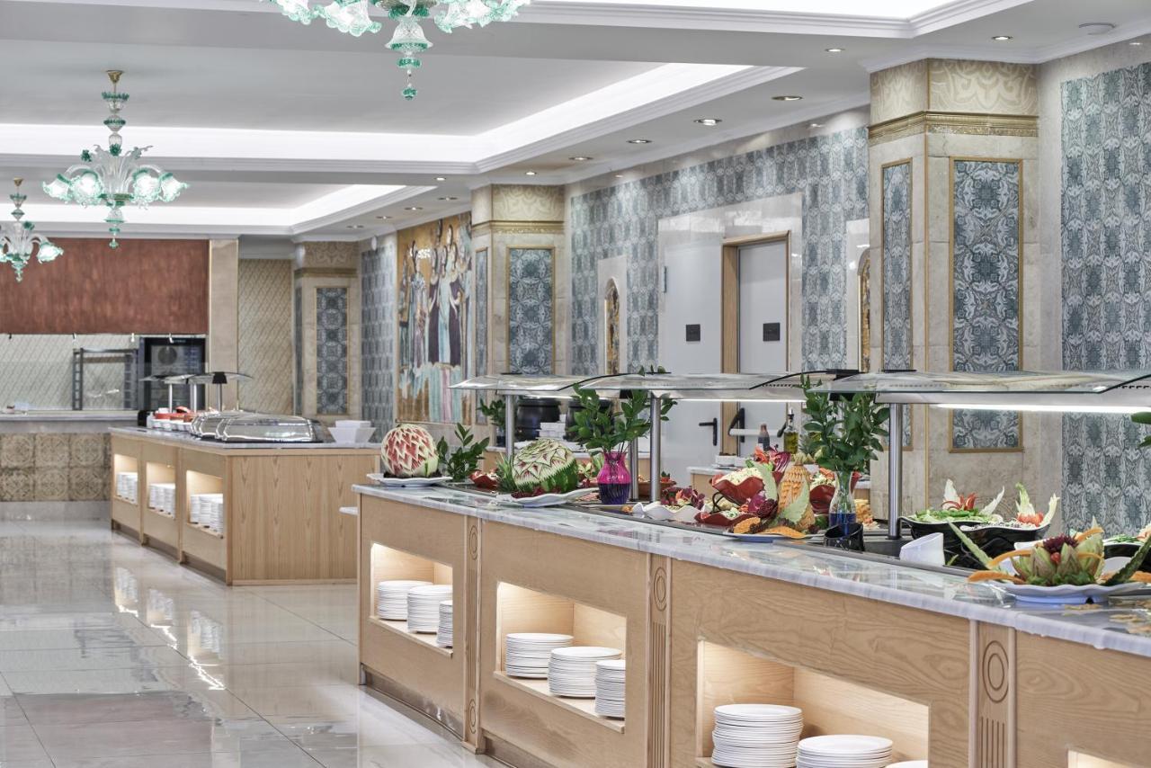 Kairaba Mythos Palace - Adults Only Kouspades ภายนอก รูปภาพ A buffet at a hotel