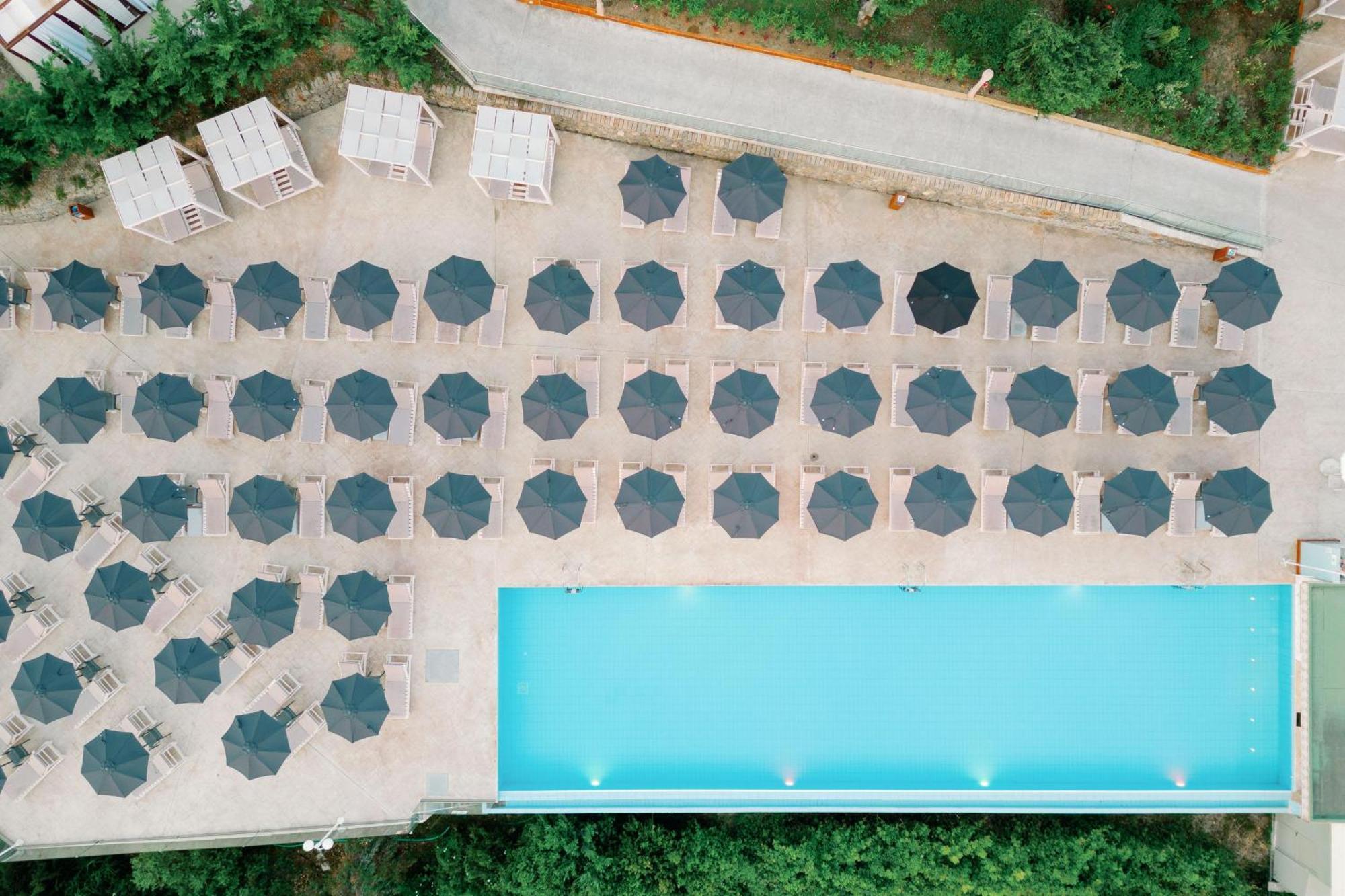 Kairaba Mythos Palace - Adults Only Kouspades ภายนอก รูปภาพ Aerial view of a pool